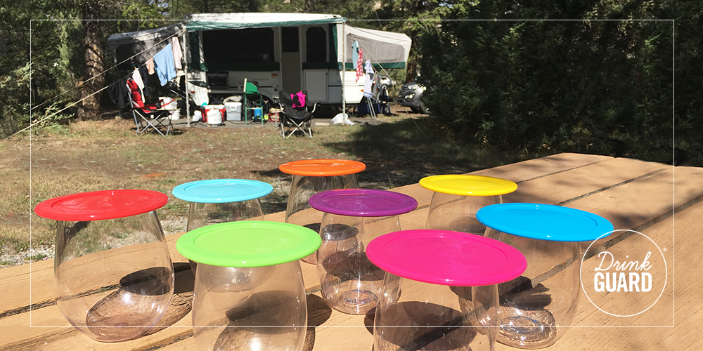 drinking glass lids at a campsite