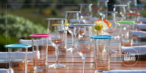 wine glass and drinking glass covers on a table