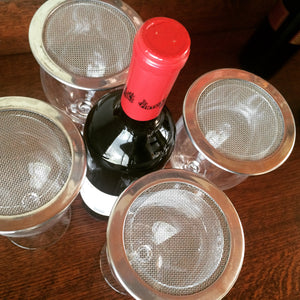 stainless steel wine glass lids on glasses