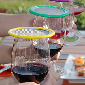 patio coloured wine glass lids on red wine glasses
